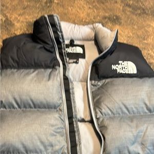Brand new Puffy women’s North Face vest. Size XL.